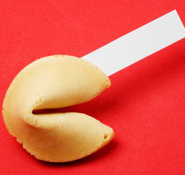 Fortune cookie with fortune slip.